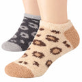 Two pairs of socks, one grey with paw prints and one beige with leopard print, on a white background.