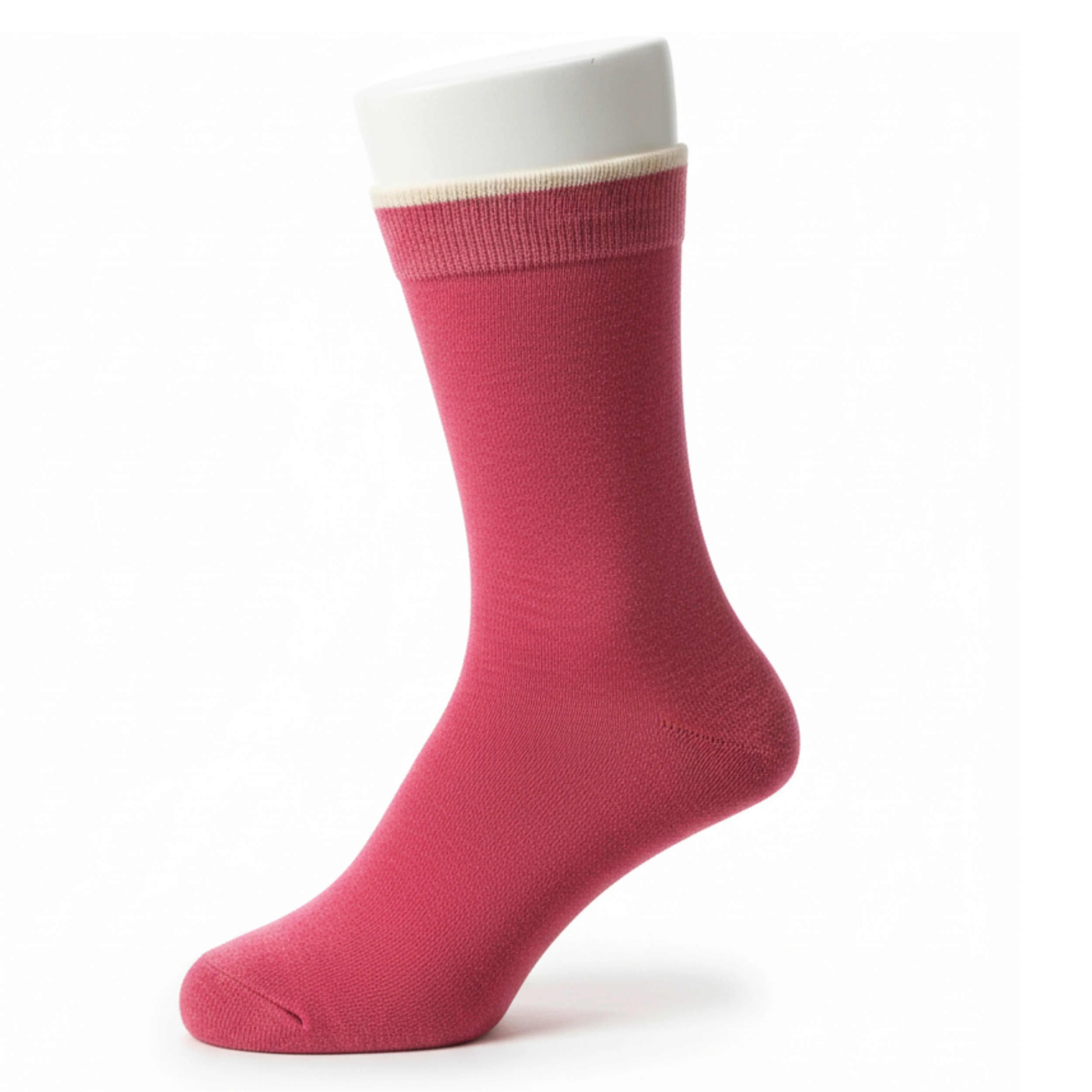 Pink sock with white cuff on a white background