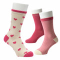 Set of three pairs of socks with heart patterns on a white background