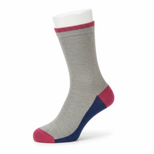 Grey sock with pink and blue accents on a white background