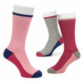 Three pairs of colourful socks on a white background
