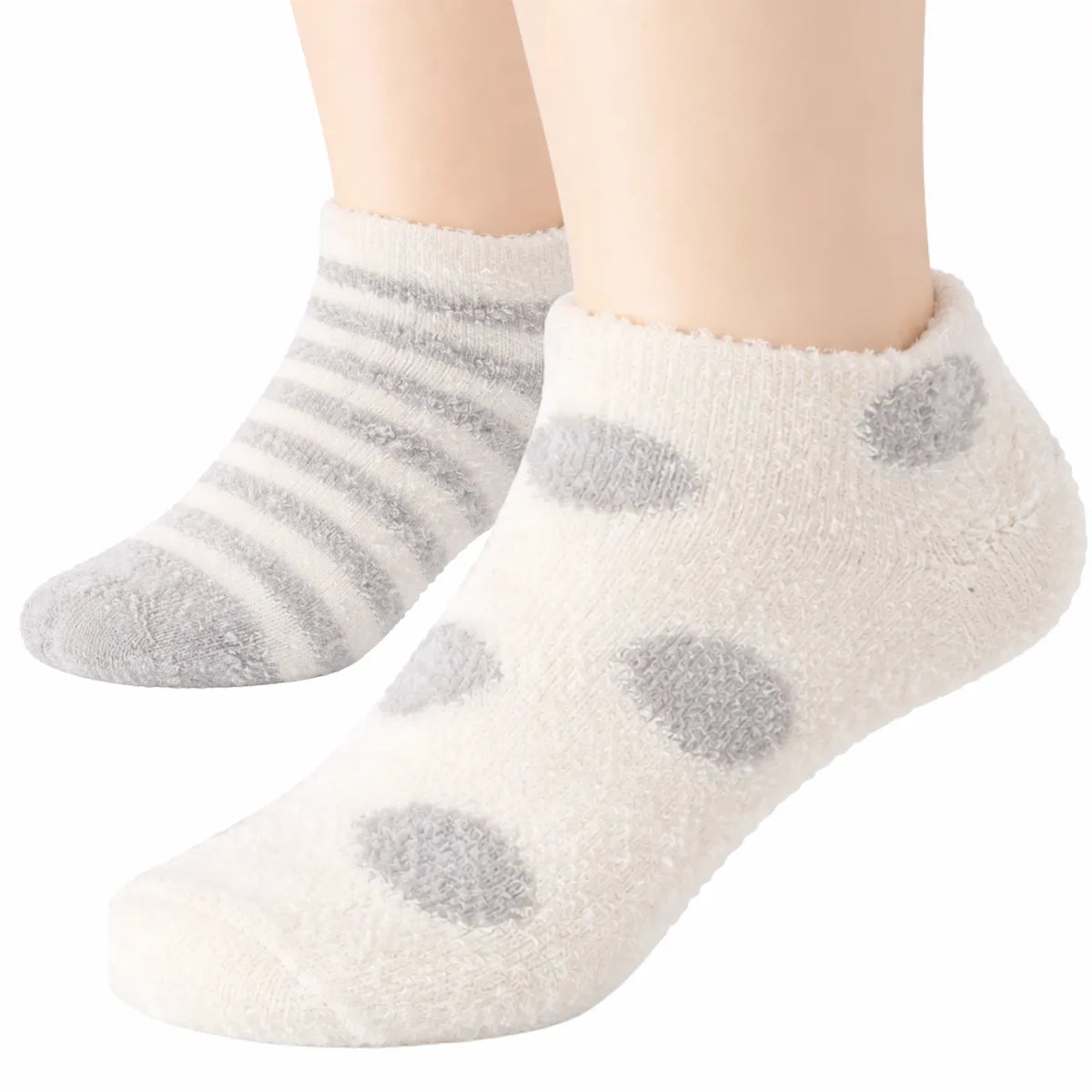 White socks with grey polka dots and stripes on a white background