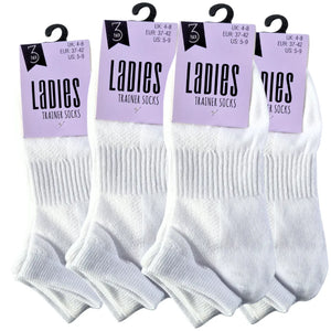 Set of white socks with packaging labels on a white background